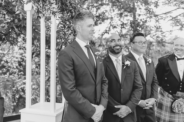 Groomsmen's reaction to the bride walking down the aisle