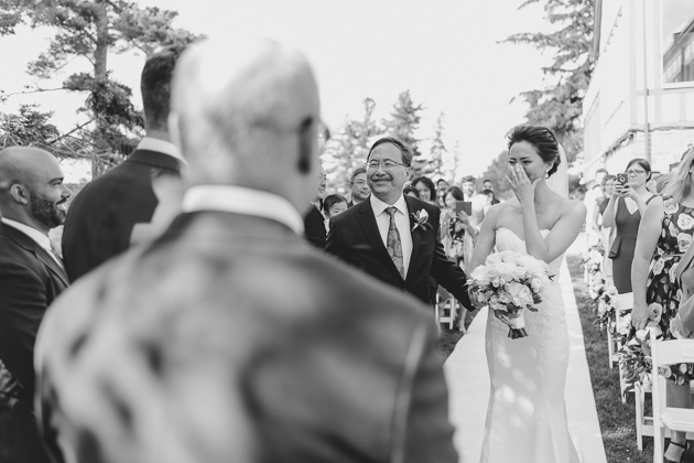 Father giving away the bride at the wedding ceremony